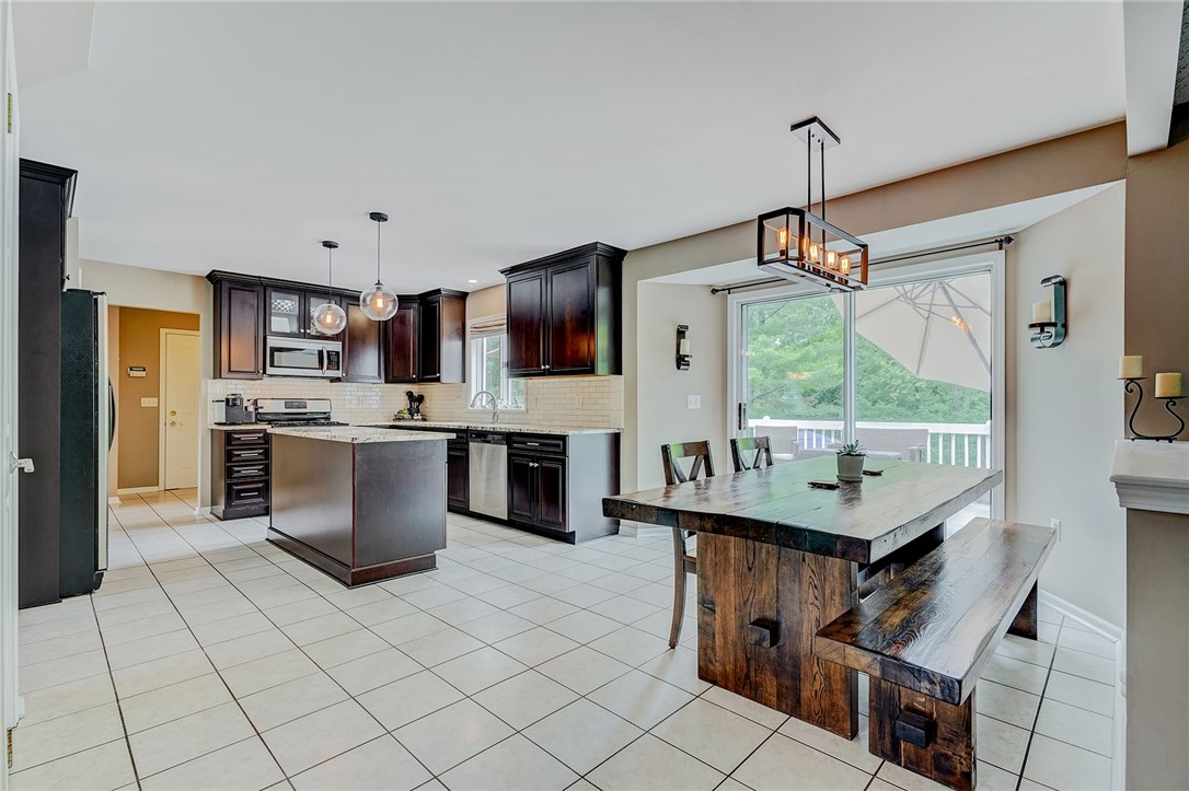 809 Lindsey Circle Webster, NY 14580 - Photo 4 of 50 BEAUTIFUL EAT-IN KITCHEN WAS RECENTLY UPDATED W/HI