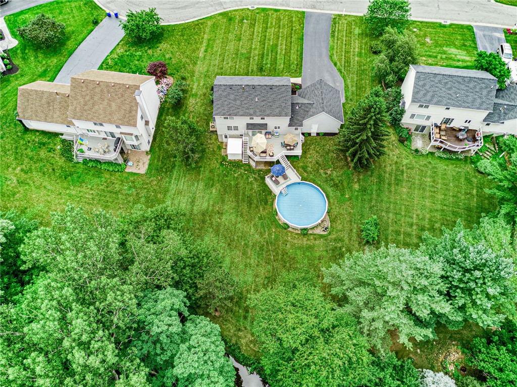 809 Lindsey Circle Webster, NY 14580 - Photo 49 of 50 ANOTHER AERIAL VIEW OF THE PRIVATE BACKYARD . . .