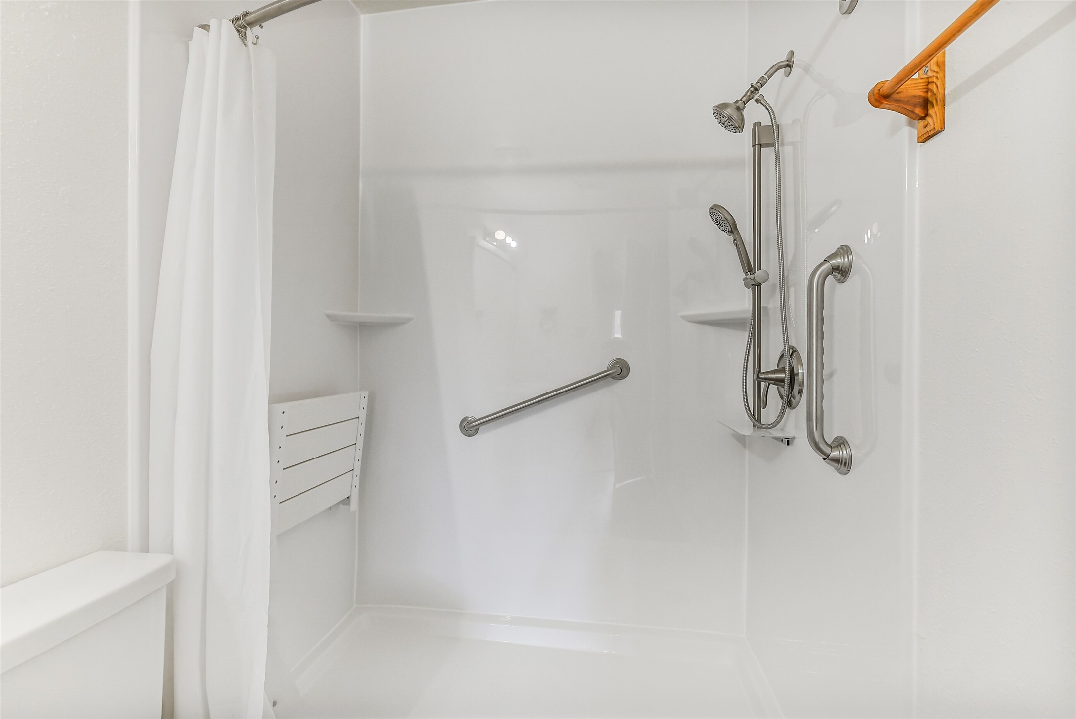 217 Lazy Lane Conroe, TX 77301 - Photo 20 of 28 a bathroom with a shower