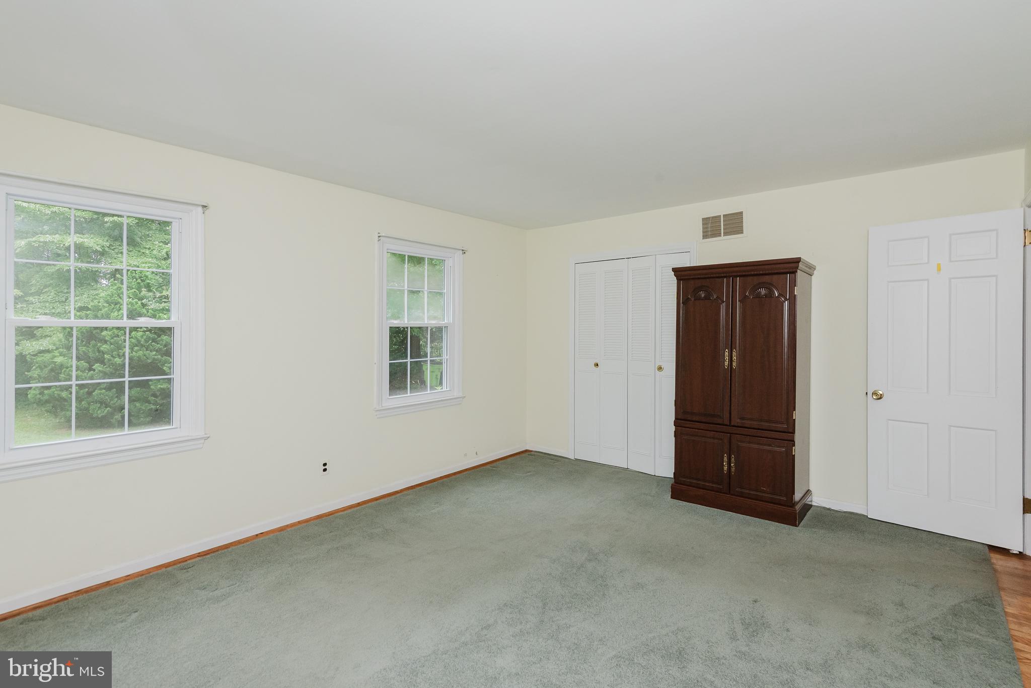 3622 Miller Road Street, MD 21154 - Photo 22 of 48 an empty room with windows and closet