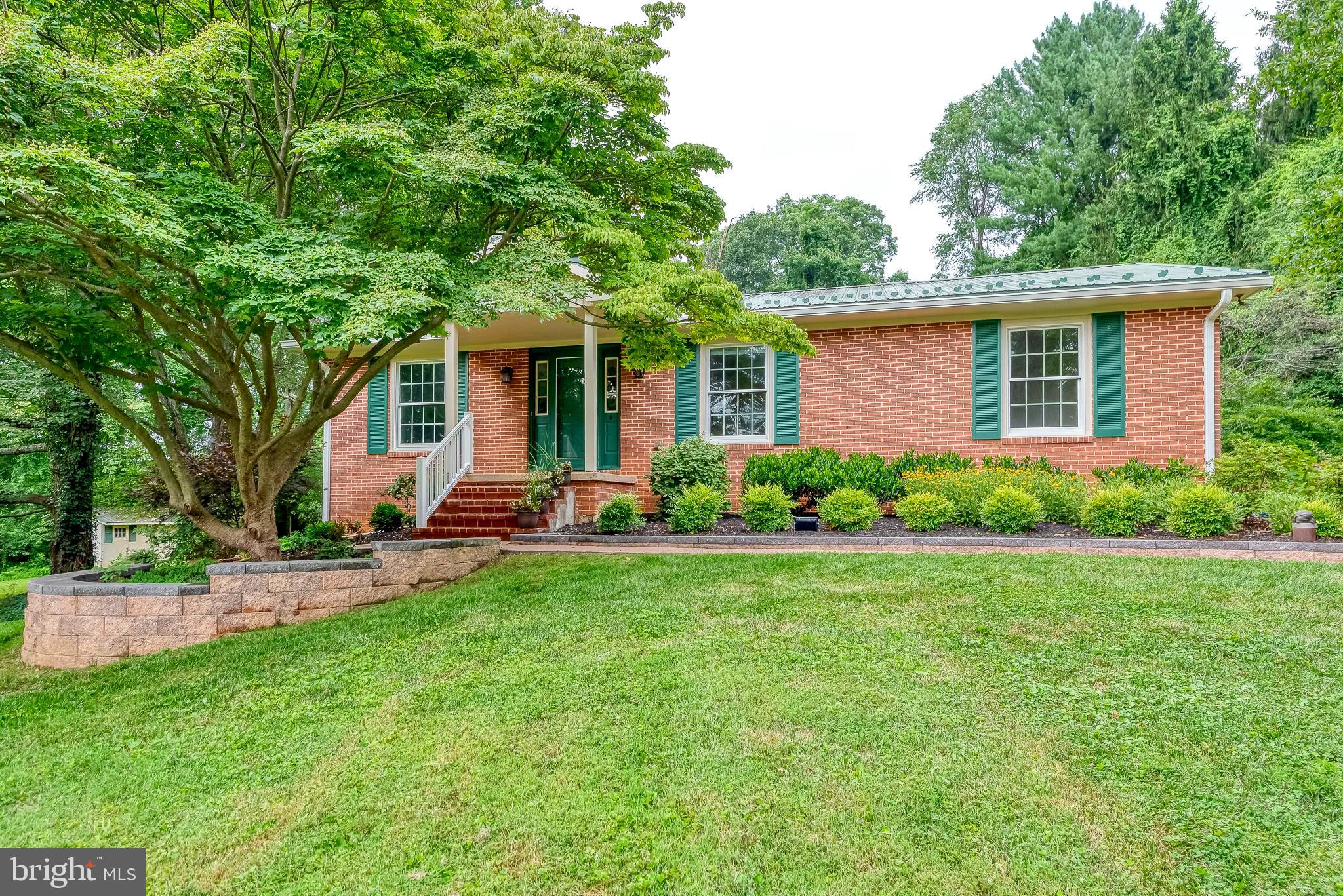 3622 Miller Road Street, MD 21154 - Photo 3 of 48 a front view of house with yard and green space
