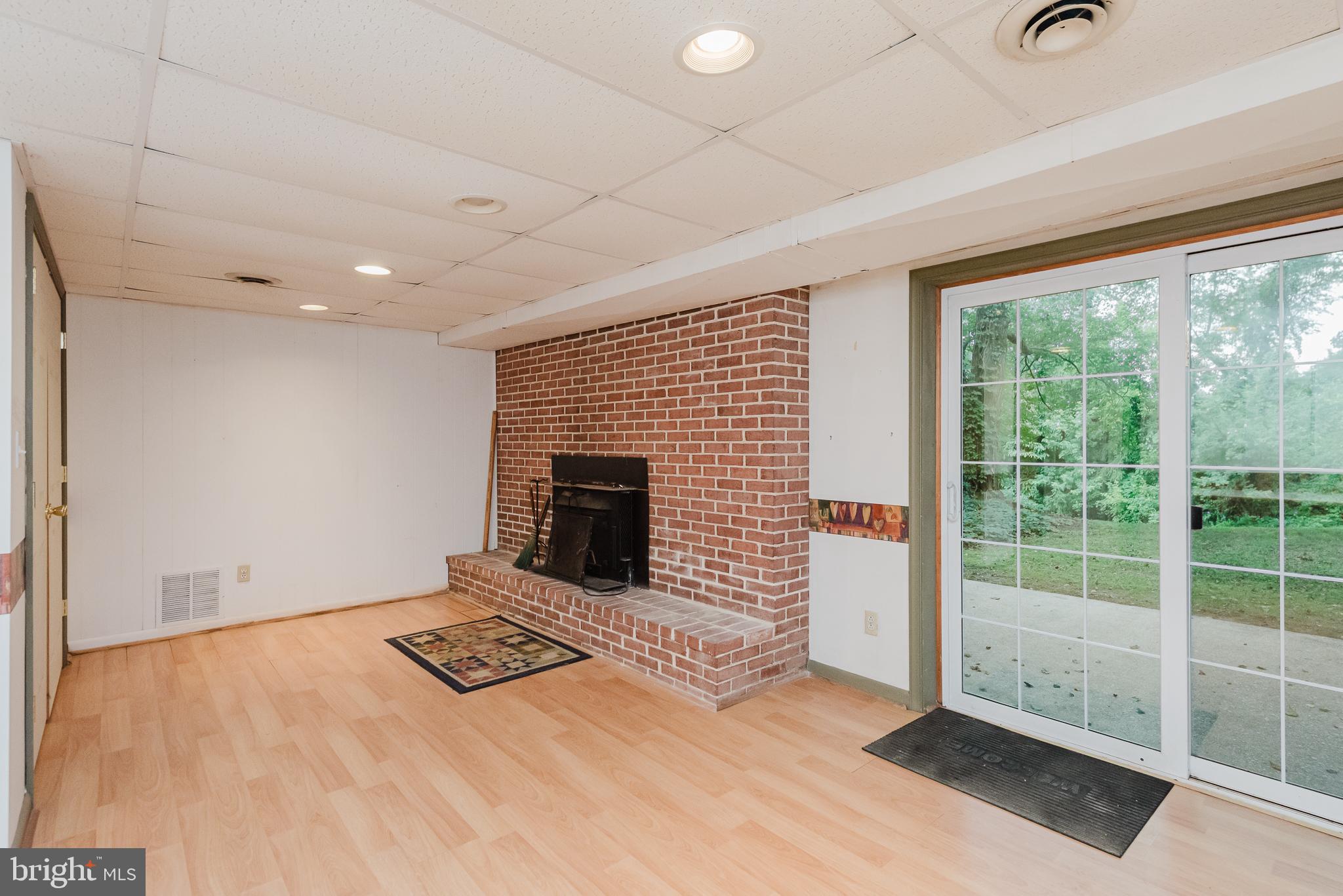 3622 Miller Road Street, MD 21154 - Photo 32 of 48 a view of a livingroom with a fireplace and window