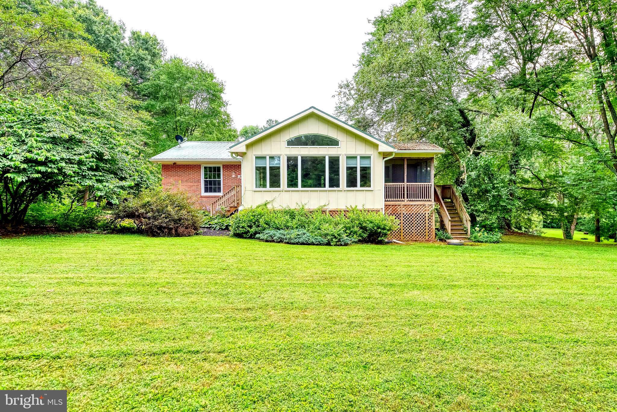 3622 Miller Road Street, MD 21154 - Photo 44 of 48 a front view of house with yard and green space