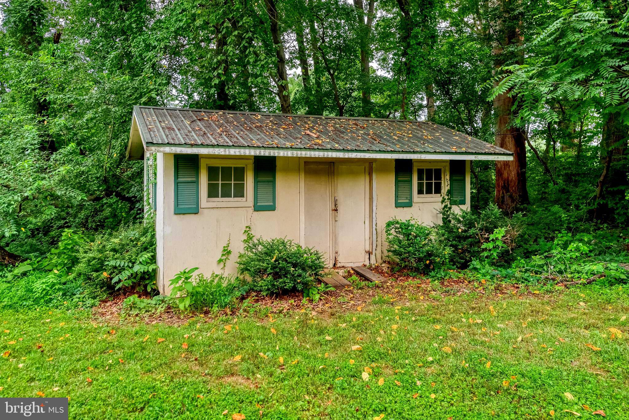3622 Miller Road Street, MD 21154 - Photo 47 of 48 a front view of house with yard and trees