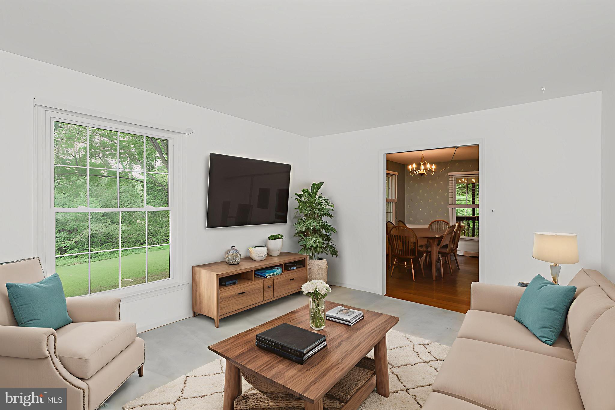 3622 Miller Road Street, MD 21154 - Photo 6 of 48 a living room with furniture and a flat screen tv