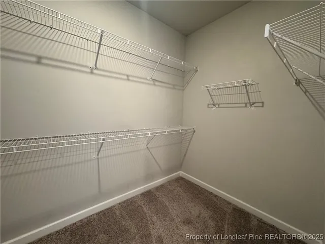 a view of a room with racks on the wall