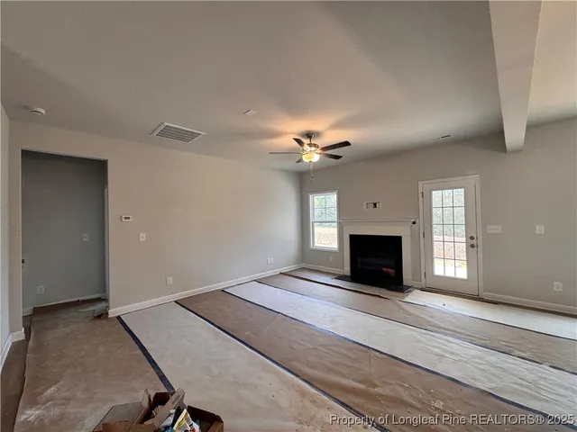 a view of a livingroom with a fireplace