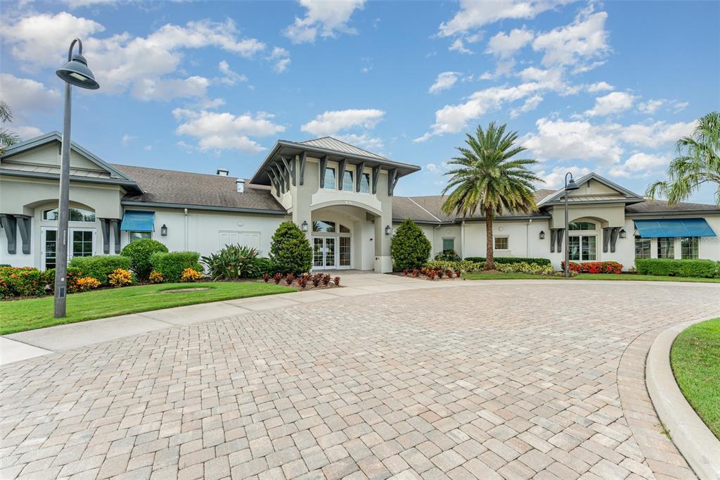 1991 Key Bay Trail Kissimmee, FL 34747 - Photo 27 of 31 a front view of house with yard and green space