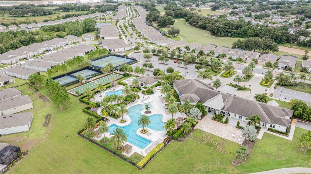 1991 Key Bay Trail Kissimmee, FL 34747 - Photo 31 of 31 an aerial view of a house with a yard and lake view