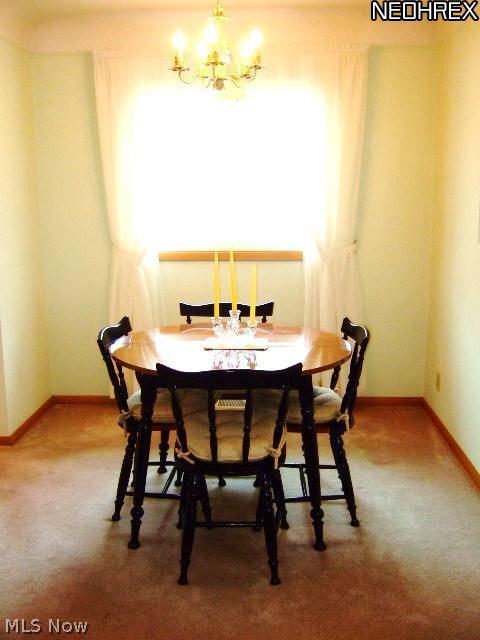 13634 Carpenter Road Garfield Heights, OH 44125 - Photo 7 of 24 Enjoy special occasions in the formal dining area just steps away for the HUGE eat in kitchen. Very convenient!