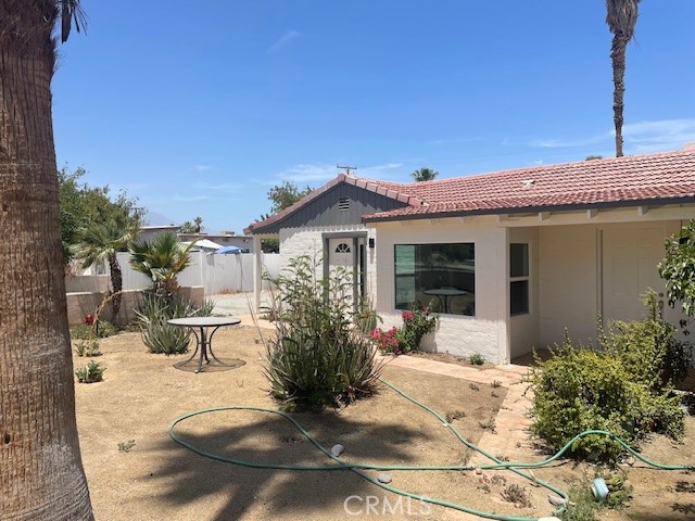 73882 Santa Rosa Way Palm Desert, CA 92260 - Photo 2 of 11 a view of a house with sitting area