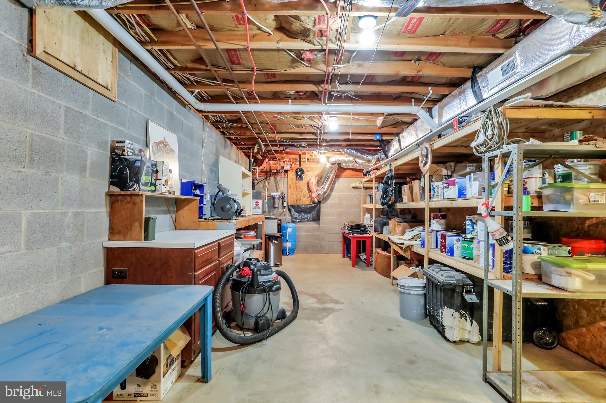 9611 Shimpstown Road Mercersburg, PA 17236 - Photo 118 of 147 Workshop Area of Lower Garage - TONS of Storage!!
