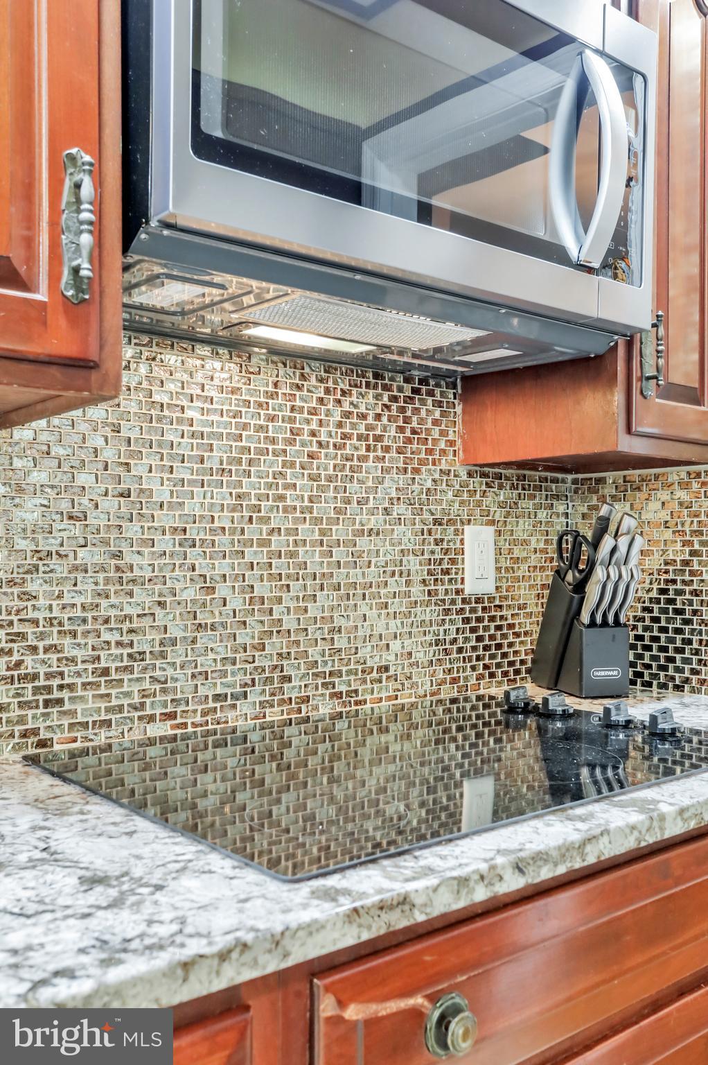 9611 Shimpstown Road Mercersburg, PA 17236 - Photo 28 of 147 NEW Cook-top, Mosaic BS, Exotic Granite, Stainless