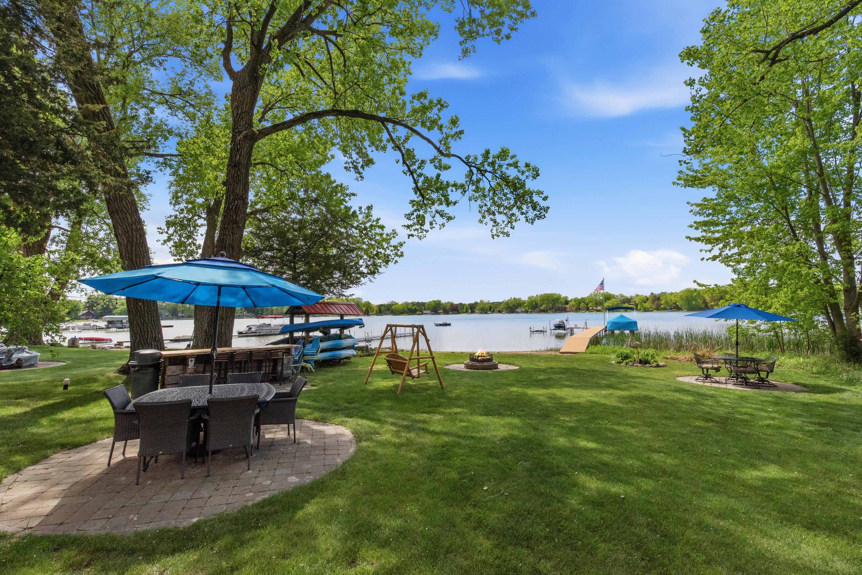 W376S4887 East Pretty Lake Road Ottawa, WI 53118 - Photo 8 of 61 Sandy bottom, 65 feet lake frontage. Dock Included.
