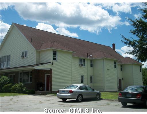 619 Wauregan Road Killingly, CT 06239 - Photo 1 of 1 a car parked in front of a house