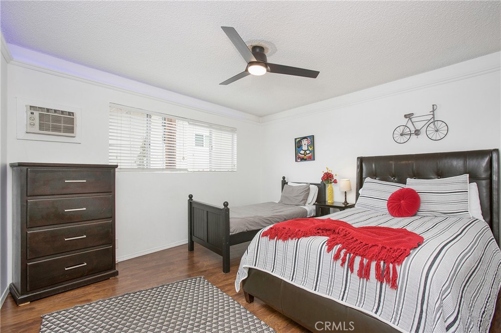 140 Avenida Algodon, Unit C San Clemente, CA 92672 - Photo 6 of 14 a bedroom with a bed and window