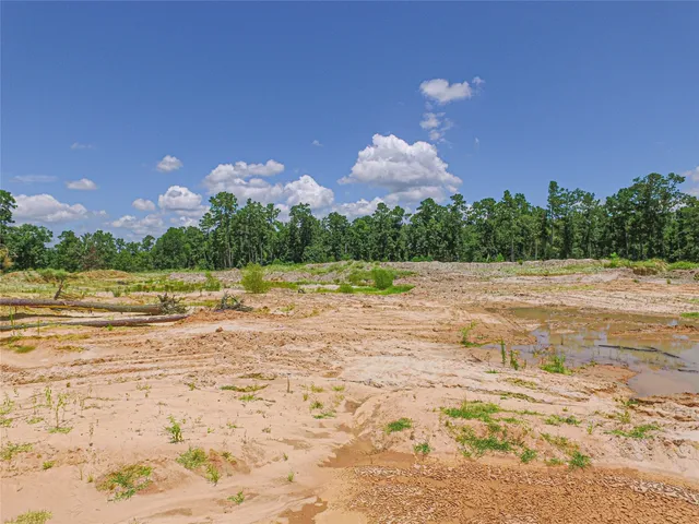 a view of a lake with a big yard