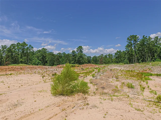 a view of lake view with mountain in the background