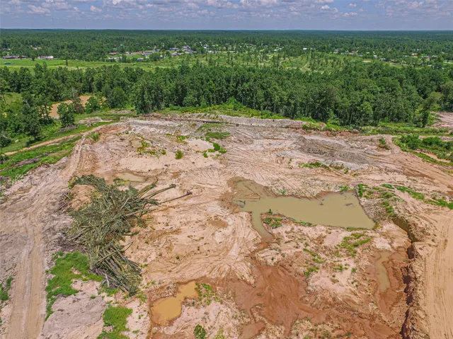 a view of a backyard of the house