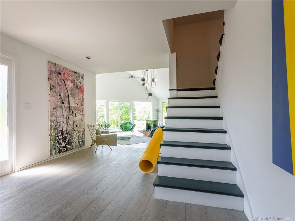 110 Geer Mountain Road Kent, CT 06785 - Photo 24 of 40 a view of entryway with wooden floor and front door