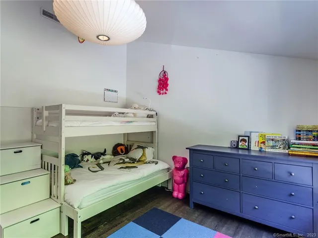 a utility room with cabinets and furniture