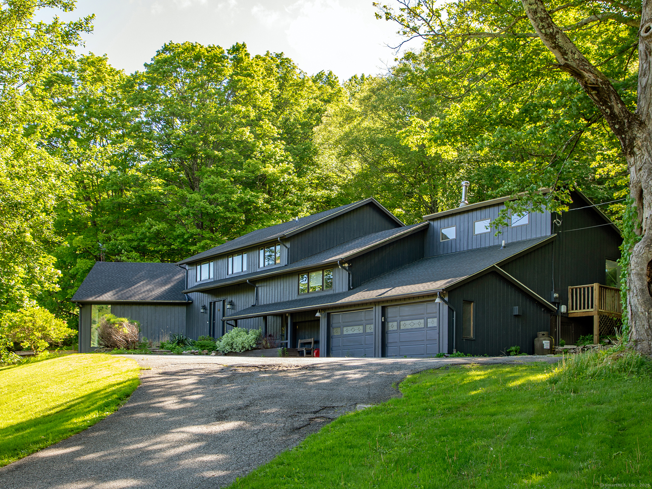 110 Geer Mountain Road Kent, CT 06785 - Photo 35 of 40 a view of a yard in front of a house with large tree