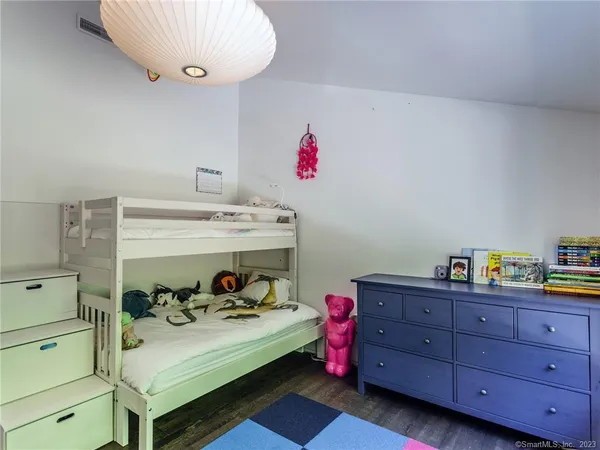 a utility room with cabinets and furniture