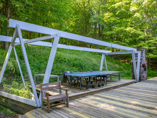 a view of a two chairs in the deck