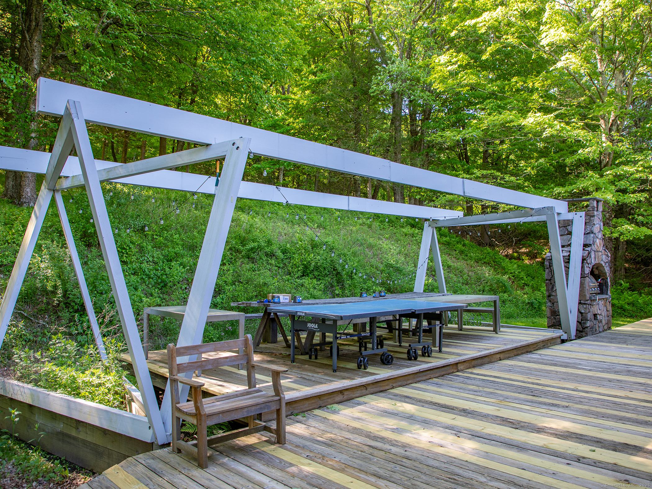 110 Geer Mountain Road Kent, CT 06785 - Photo 39 of 40 a view of a two chairs in the deck