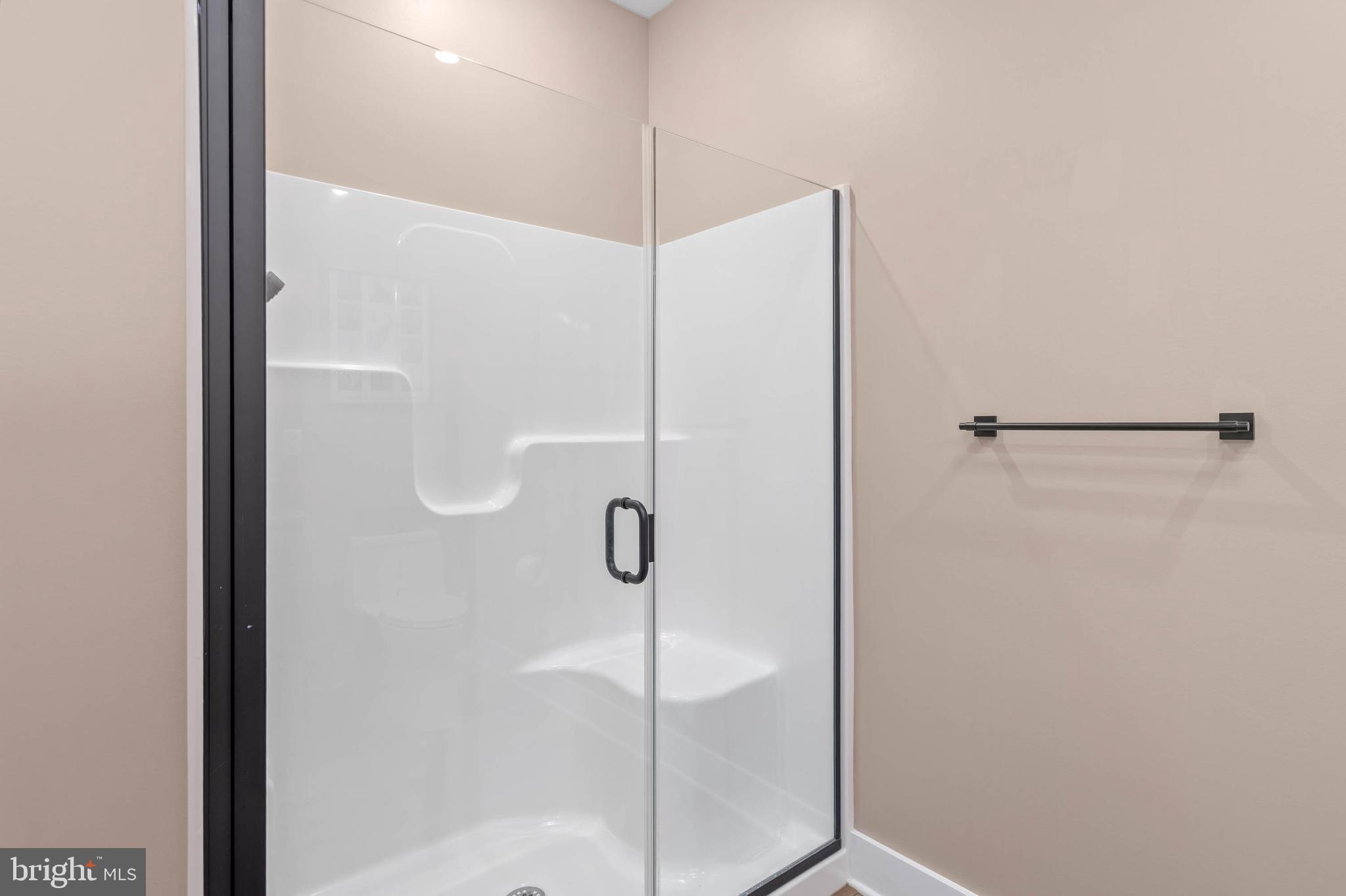 38155 Muddy Neck Road Ocean View, DE 19970 - Photo 13 of 67 a bathroom with a shower