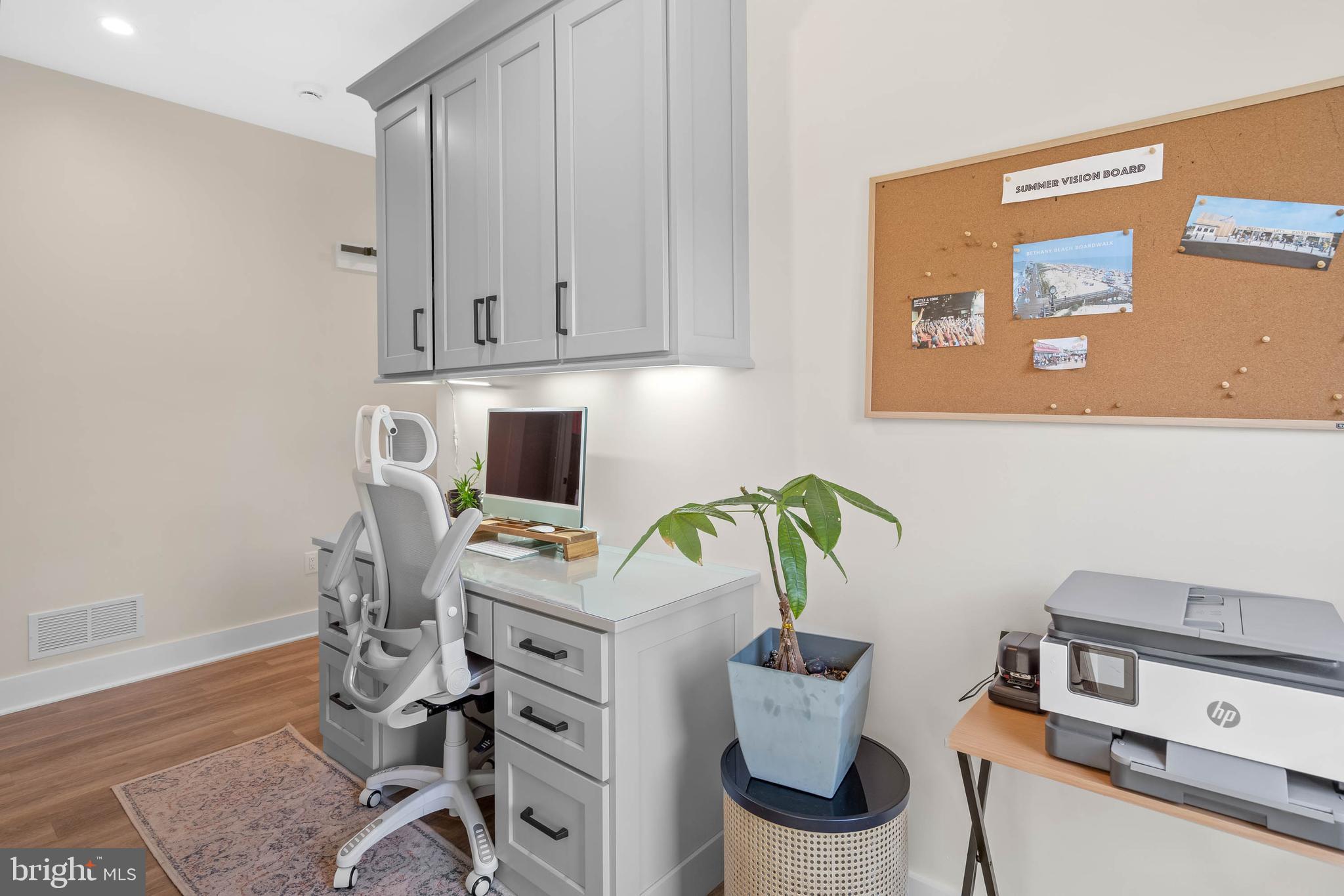 38155 Muddy Neck Road Ocean View, DE 19970 - Photo 16 of 67 a workspace with furniture and wooden floor