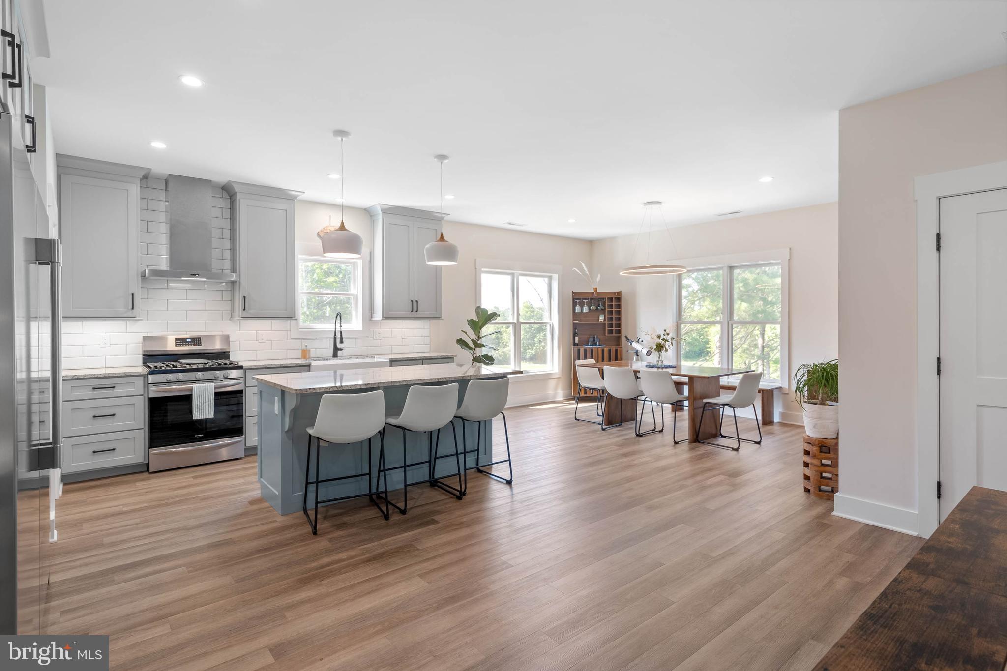 38155 Muddy Neck Road Ocean View, DE 19970 - Photo 21 of 67 a large kitchen with lots of counter space and stainless steel appliances