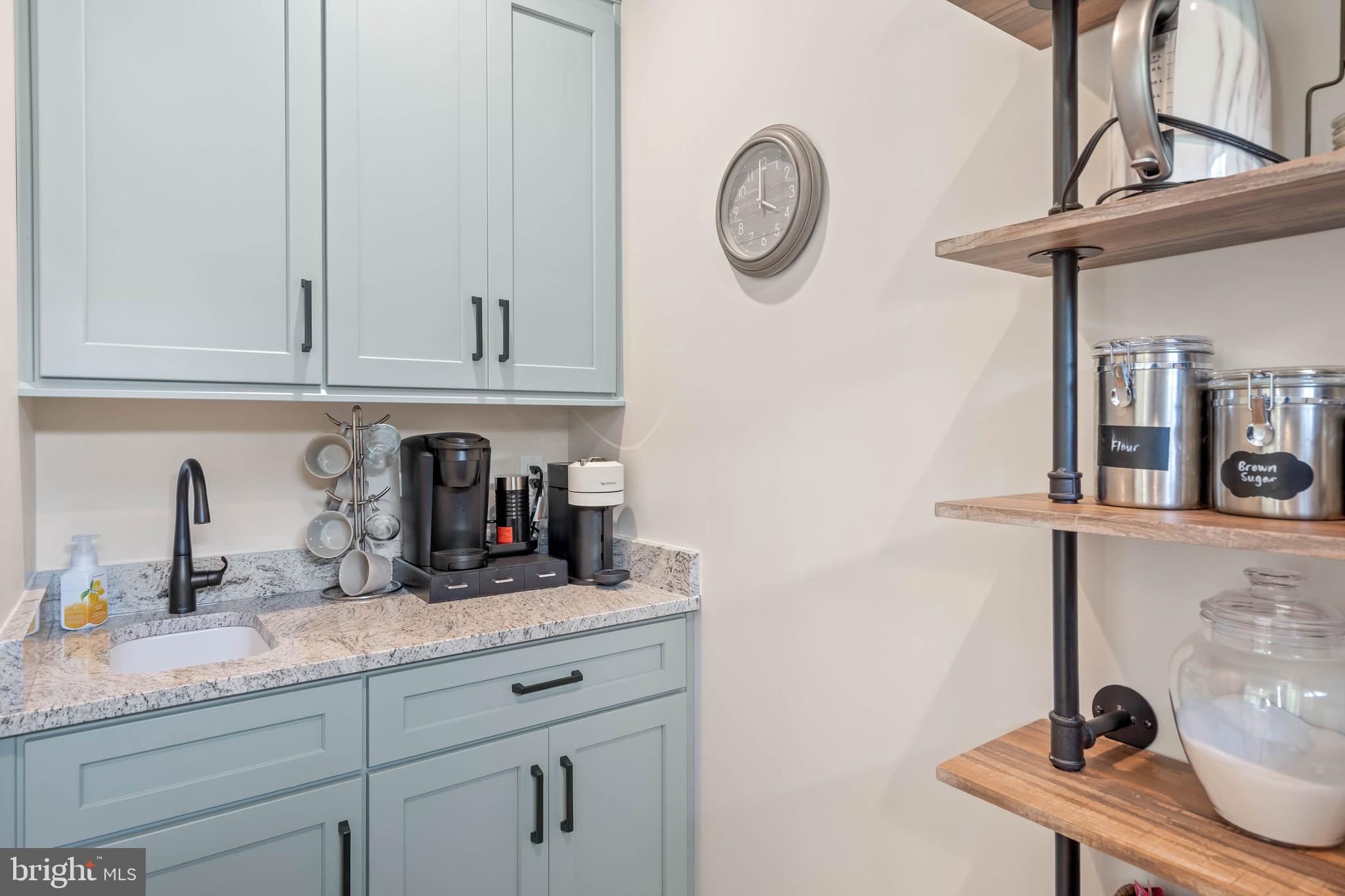 38155 Muddy Neck Road Ocean View, DE 19970 - Photo 27 of 67 a kitchen with a sink and cabinets