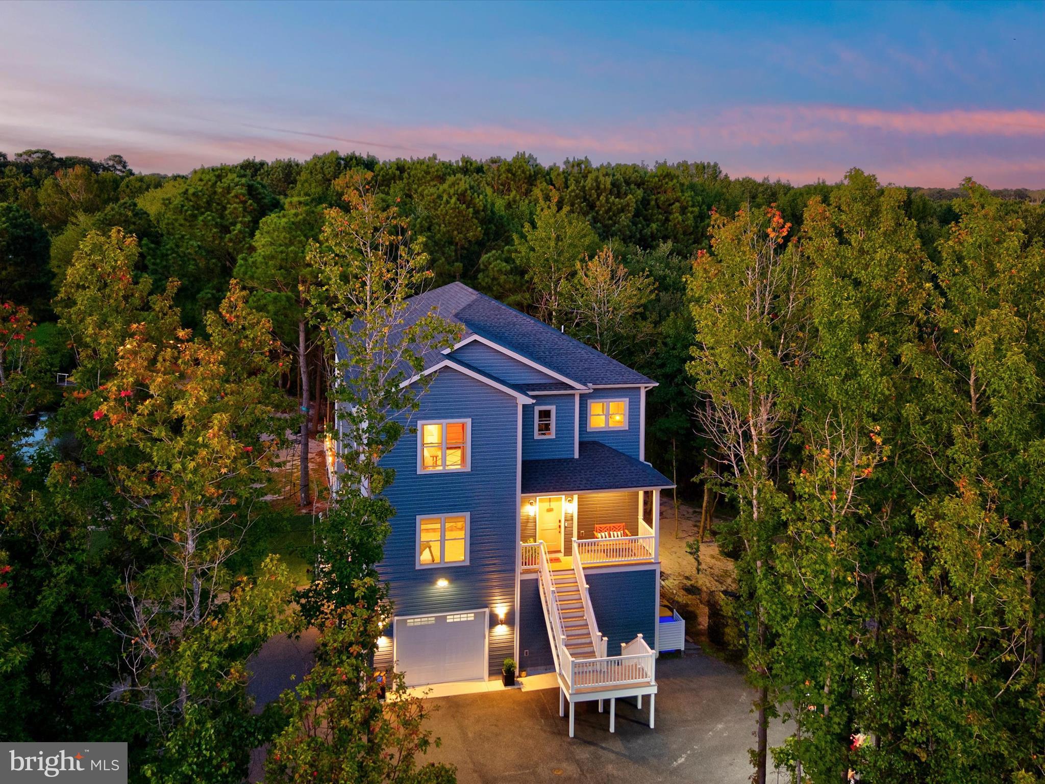 38155 Muddy Neck Road Ocean View, DE 19970 - Photo 3 of 67 a view of a two chairs in front of a building