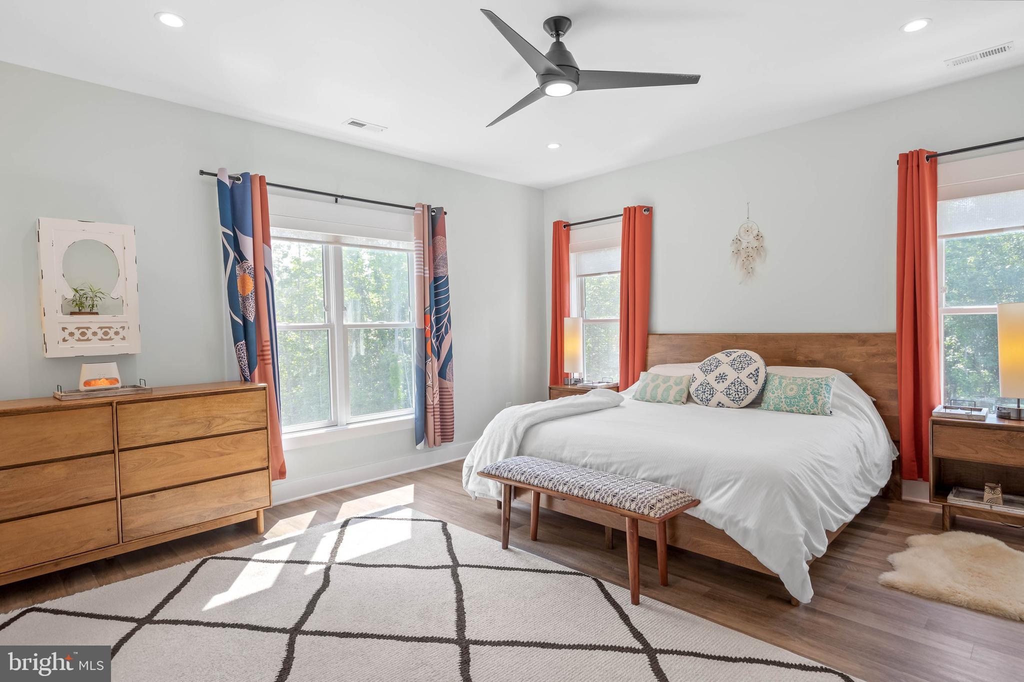 38155 Muddy Neck Road Ocean View, DE 19970 - Photo 31 of 67 a bedroom with a bed and a window