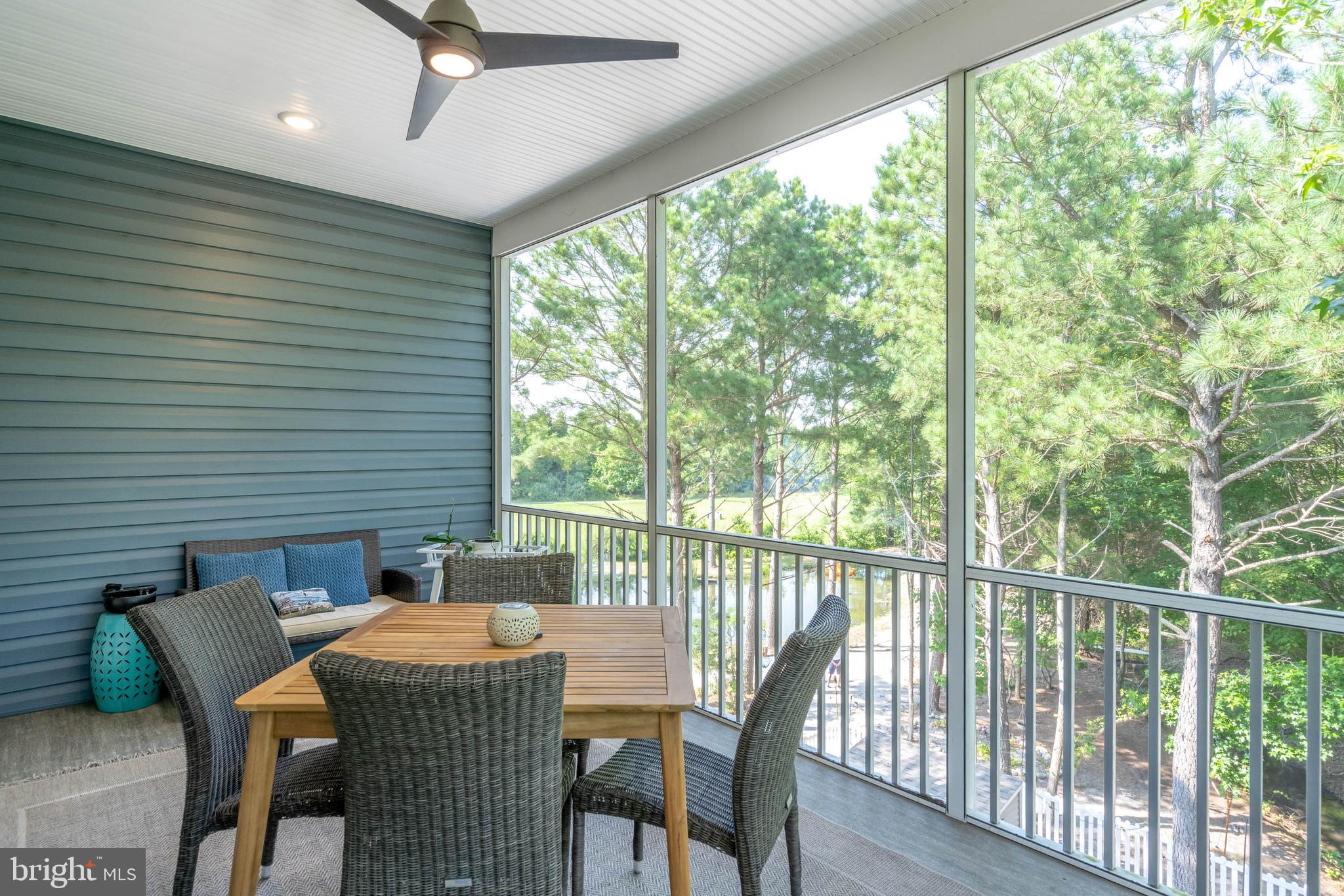 38155 Muddy Neck Road Ocean View, DE 19970 - Photo 43 of 67 a view of a dining room with furniture window and outside view