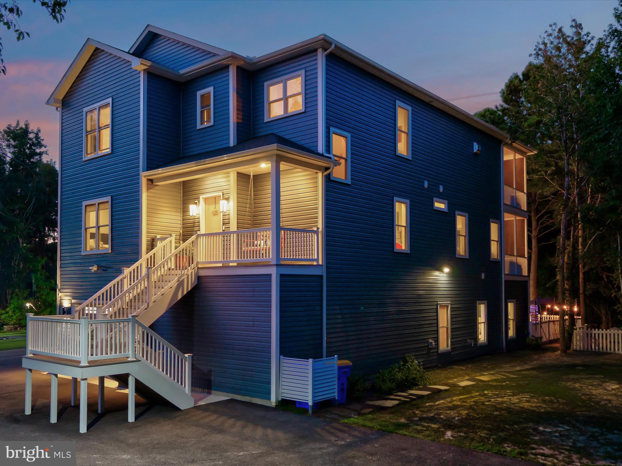 38155 Muddy Neck Road Ocean View, DE 19970 - Photo 64 of 67 a front view of a house with a yard