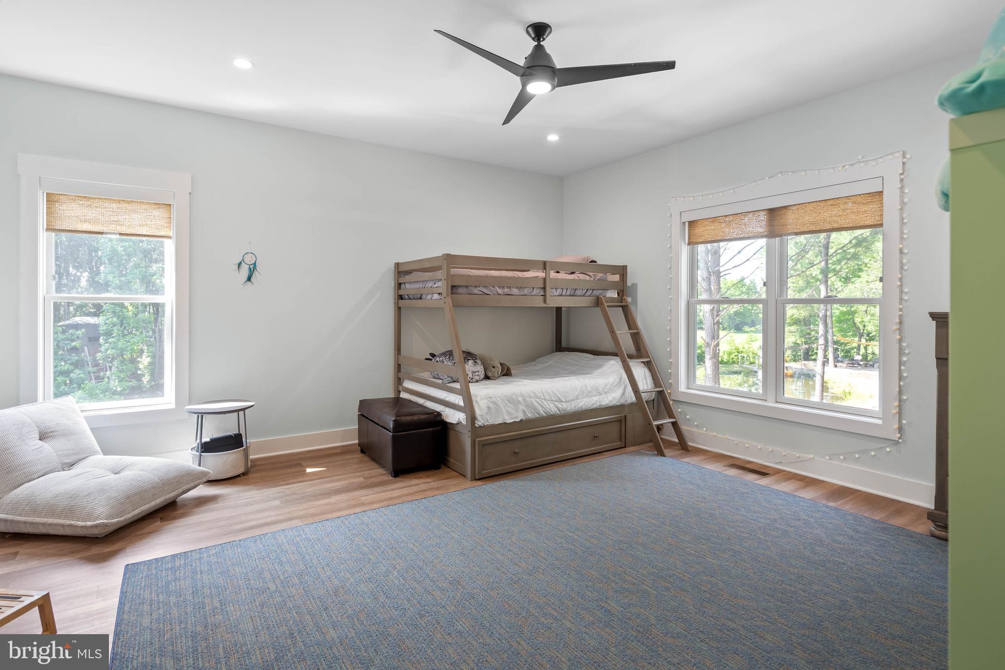 38155 Muddy Neck Road Ocean View, DE 19970 - Photo 10 of 67 a living room with furniture and a window