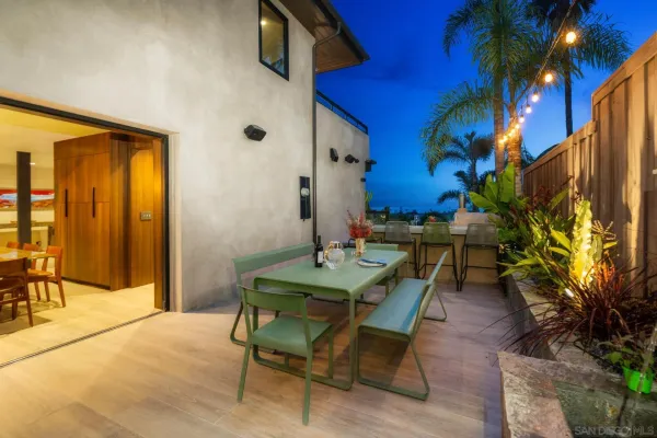 a view of a swimming pool with a patio