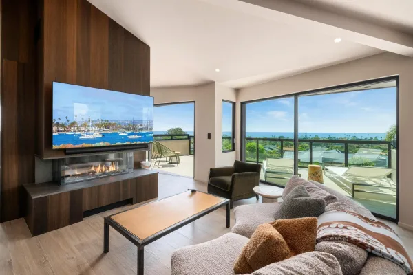 a view of a dining table and chairs in patio