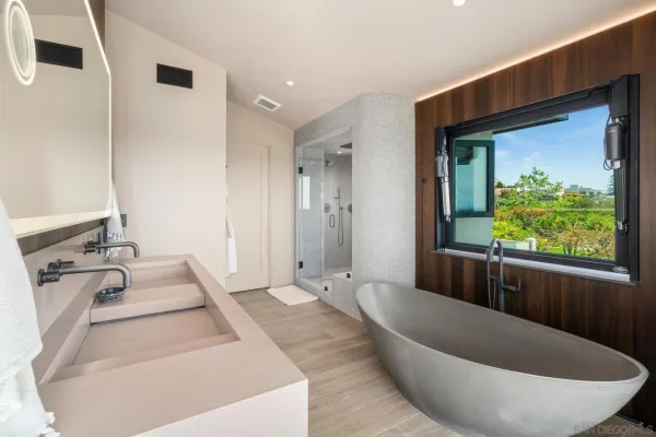 a utility room with sink dryer and washer