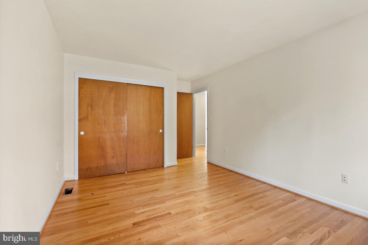 2606 Deerdell Lane Reston, VA 20191 - Photo 39 of 49 a view of an empty room and wooden floor