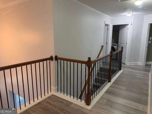 a view of a balcony with wooden floor