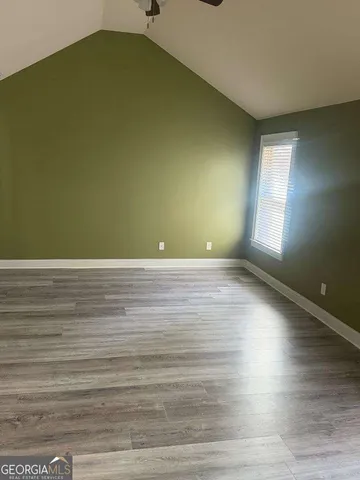 a view of a kitchen from the hallway