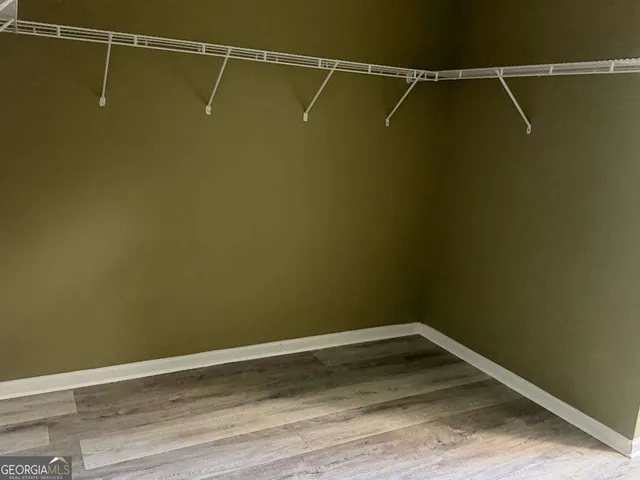 a view of walk in closet with window