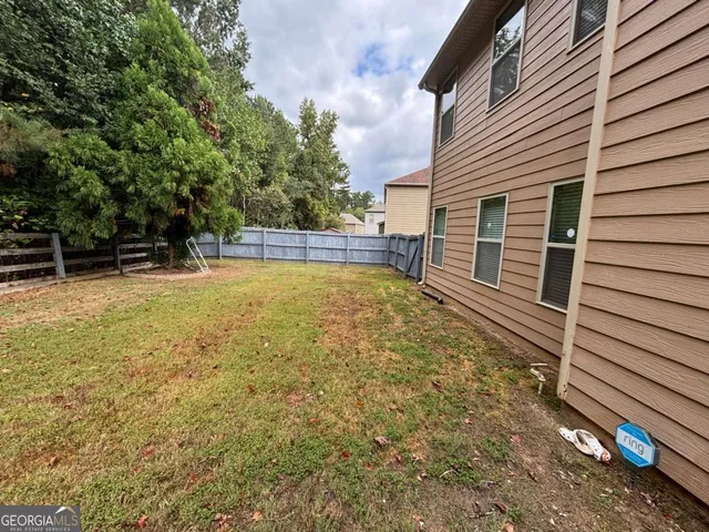 a view of a swimming pool with an outdoor space