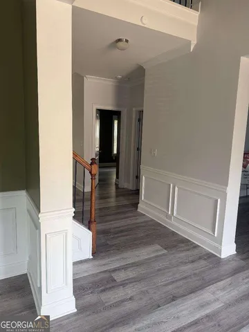 a view of entryway with wooden floor