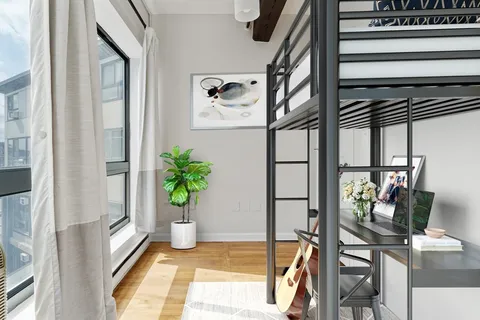 a view of balcony and dining room