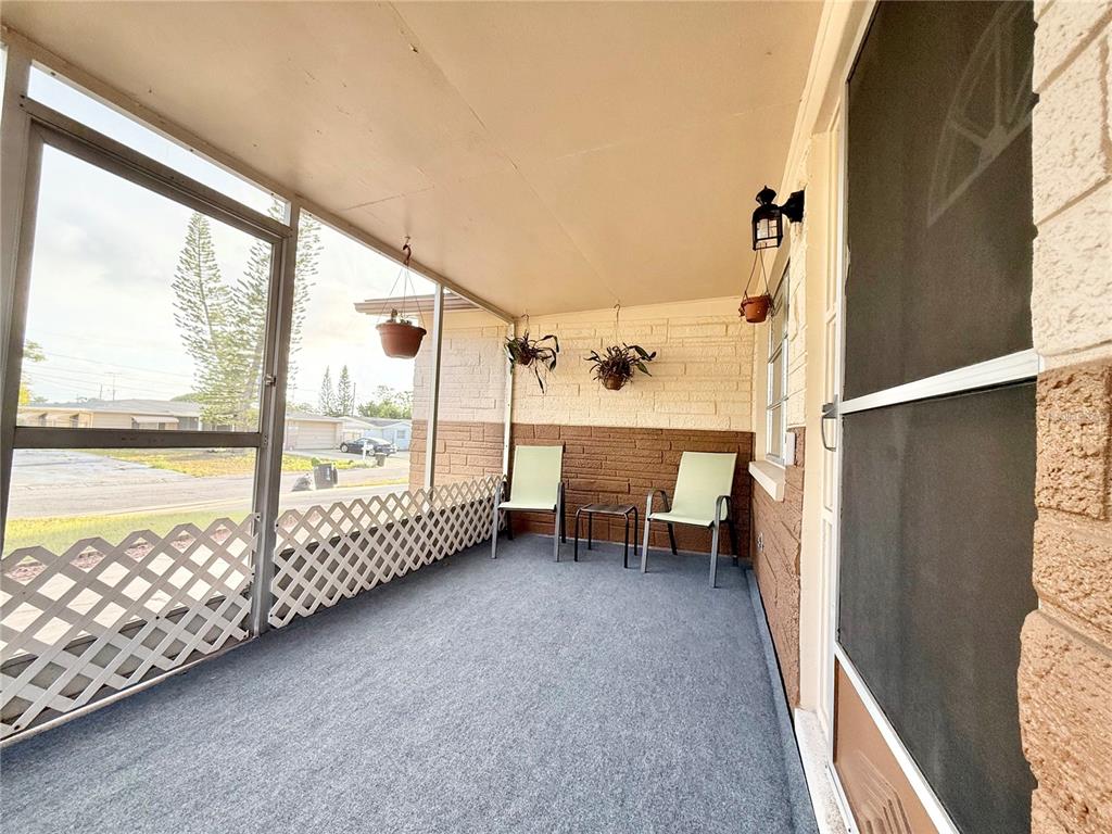 4935 Guardian Avenue Holiday, FL 34690 - Photo 13 of 32 a view of a living room and a window