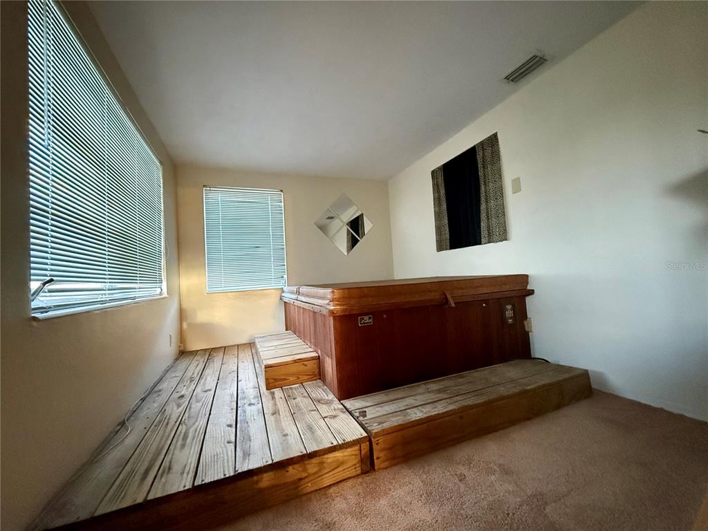 4935 Guardian Avenue Holiday, FL 34690 - Photo 30 of 32 a living room with furniture